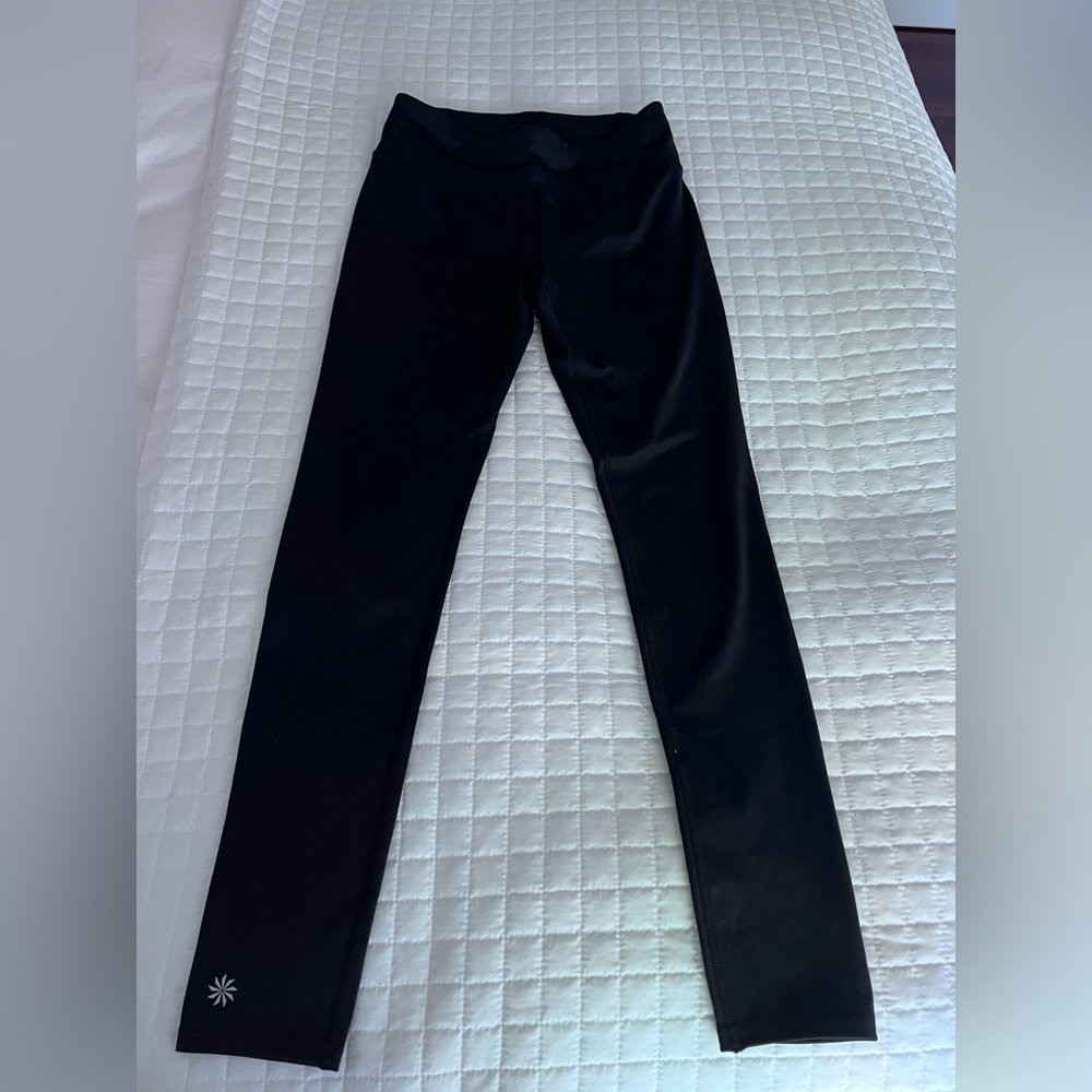 Black Athleta runnjng leggings with back zipper pocket - never worn